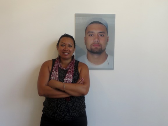 Leilani Kake with her work, "MALE - Maori or Polynesian" (2014) // Photo courtesy of PIMPI